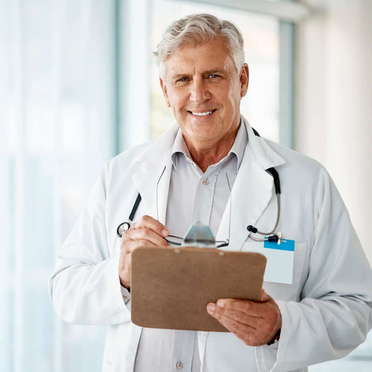 An image of a doctor holding a clipboard